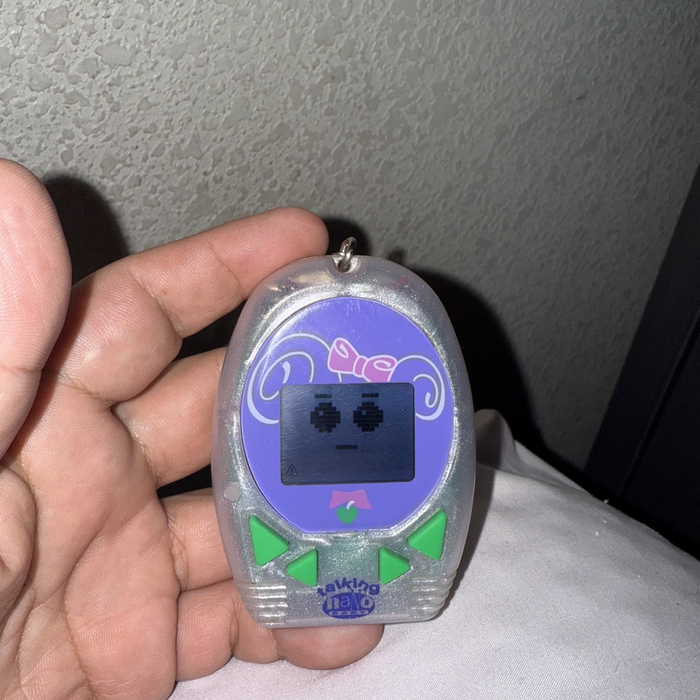 Purple and Silver Virtual Pet Keychain
